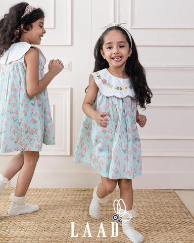 Twirl into spring with tulip dress! Mint A-line dress features tulip print & a scalloped embroidered collar. Breezy, 100% cotton. LaadIndia 
