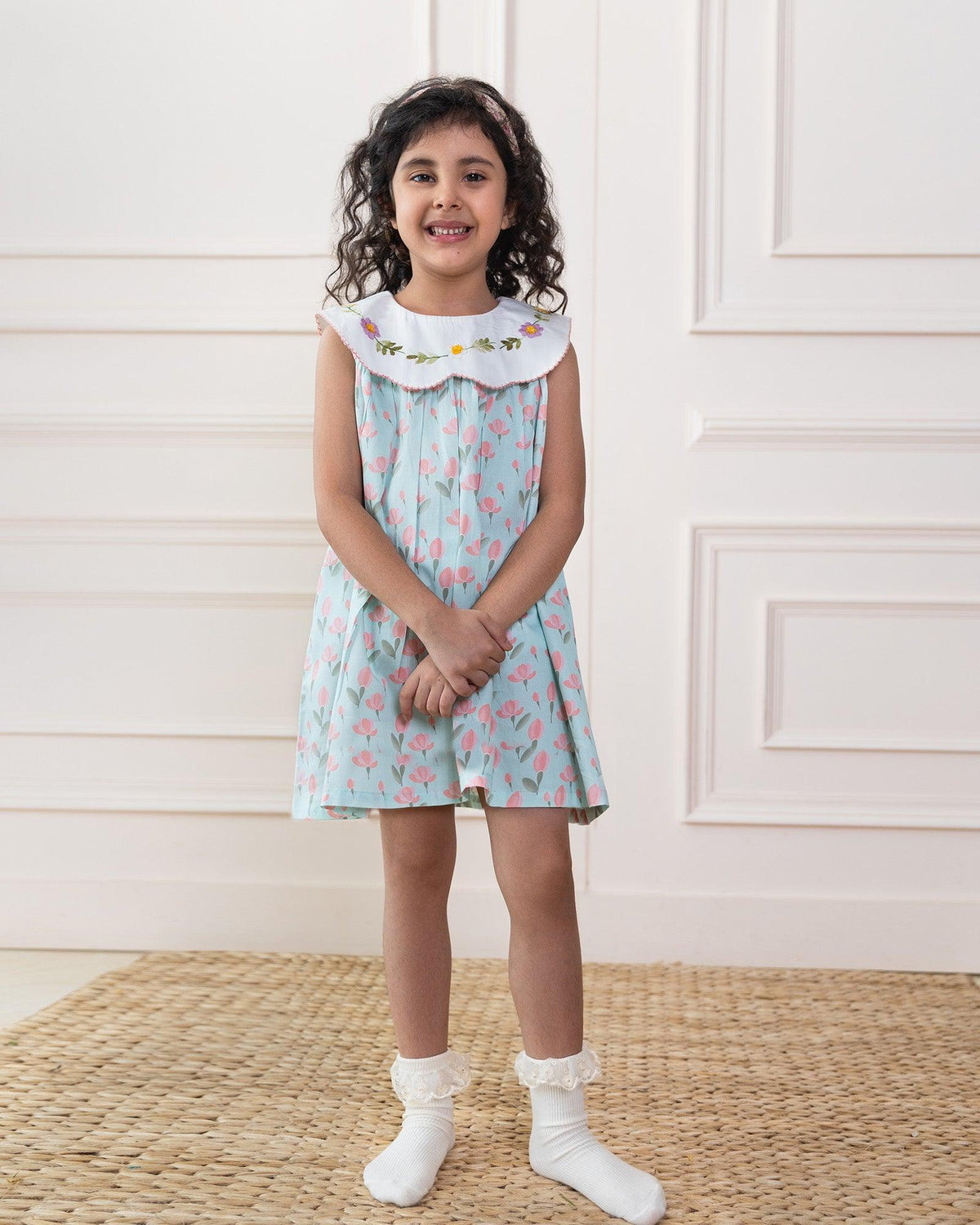 Twirl into spring with tulip dress! Mint A-line dress features tulip print & a scalloped embroidered collar. Breezy, 100% cotton. #LaadIndia 