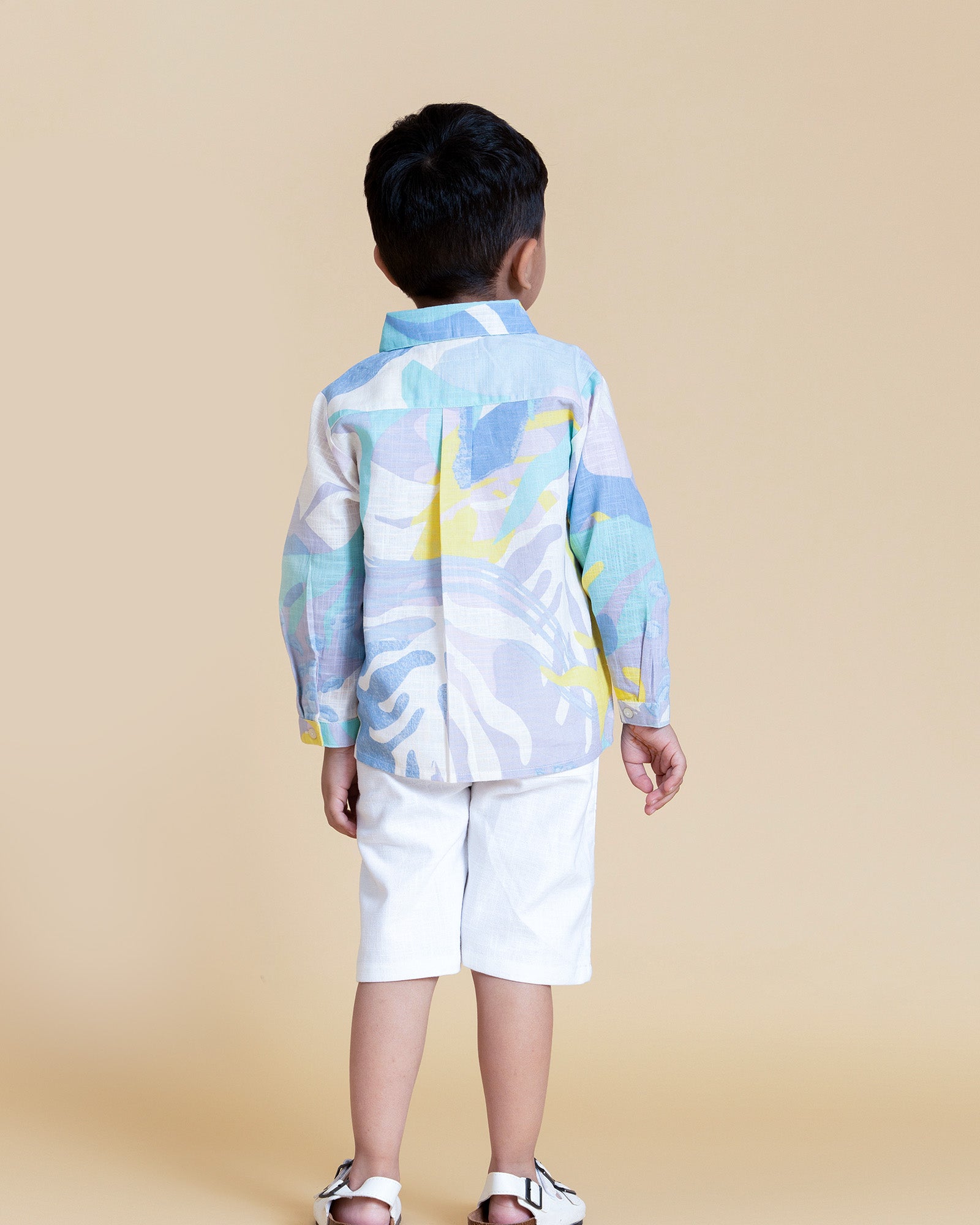 Make a splash with this ocean-themed kids’ turtle shirt featuring a vibrant sea print and hand-embroidered turtle. Breathable cotton, full sleeves, and timeless style—perfect for sunny days.