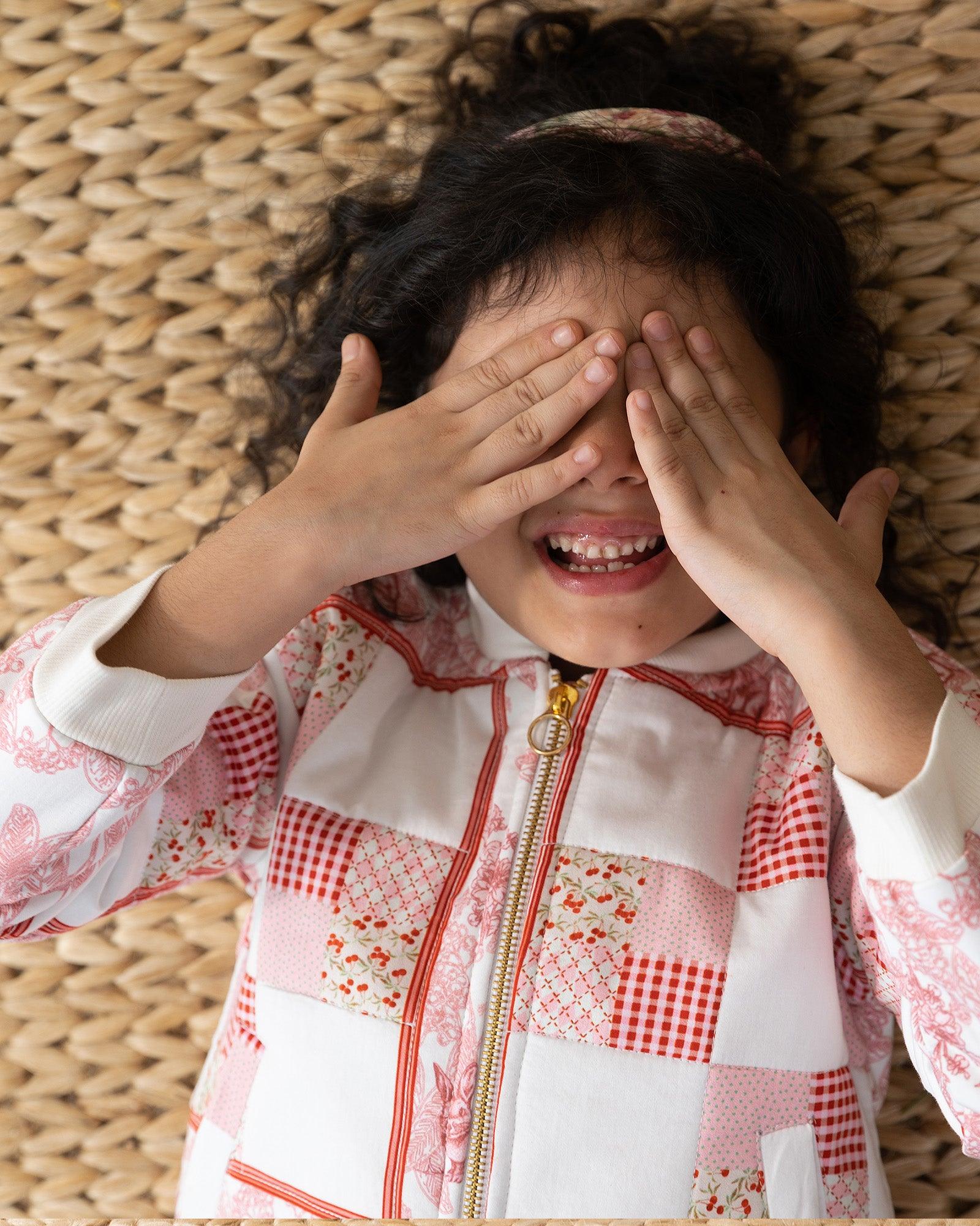 girl wearing laad's scralet colour white rabbit ptchwork bomber jacket