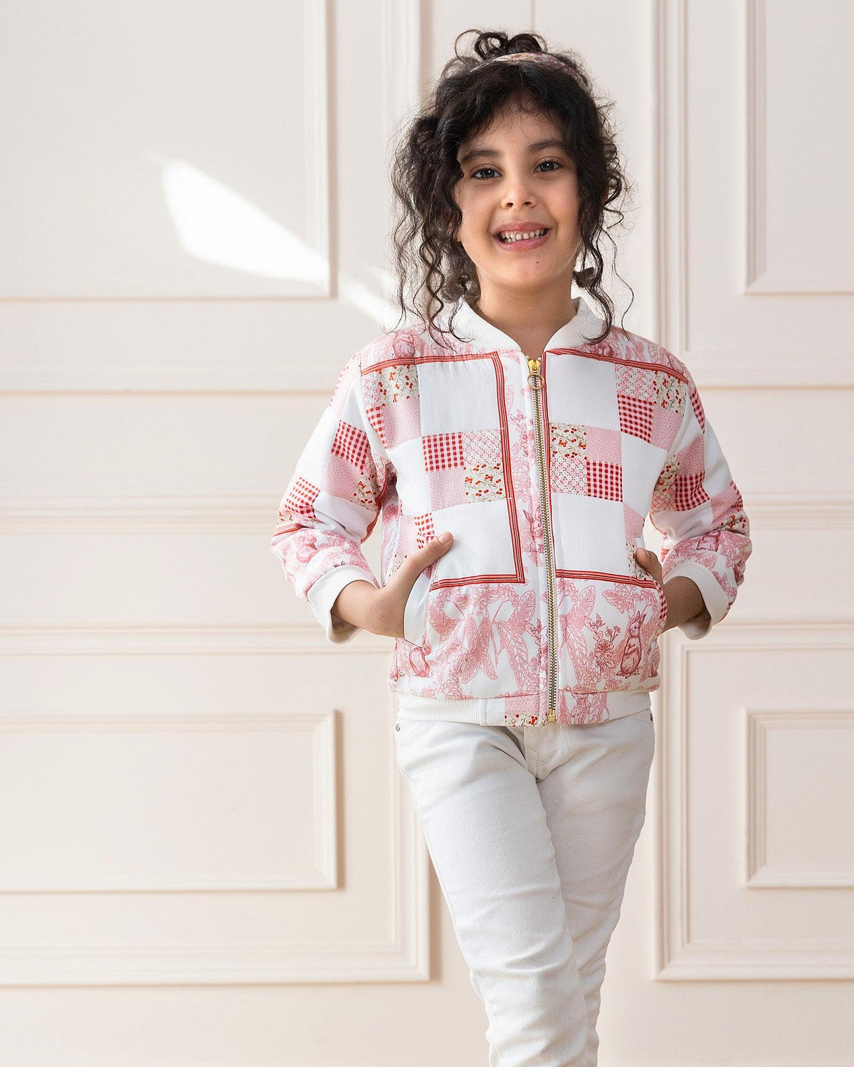 Hoppy springtime! White rabbit patchwork jacket playfully features bunny details