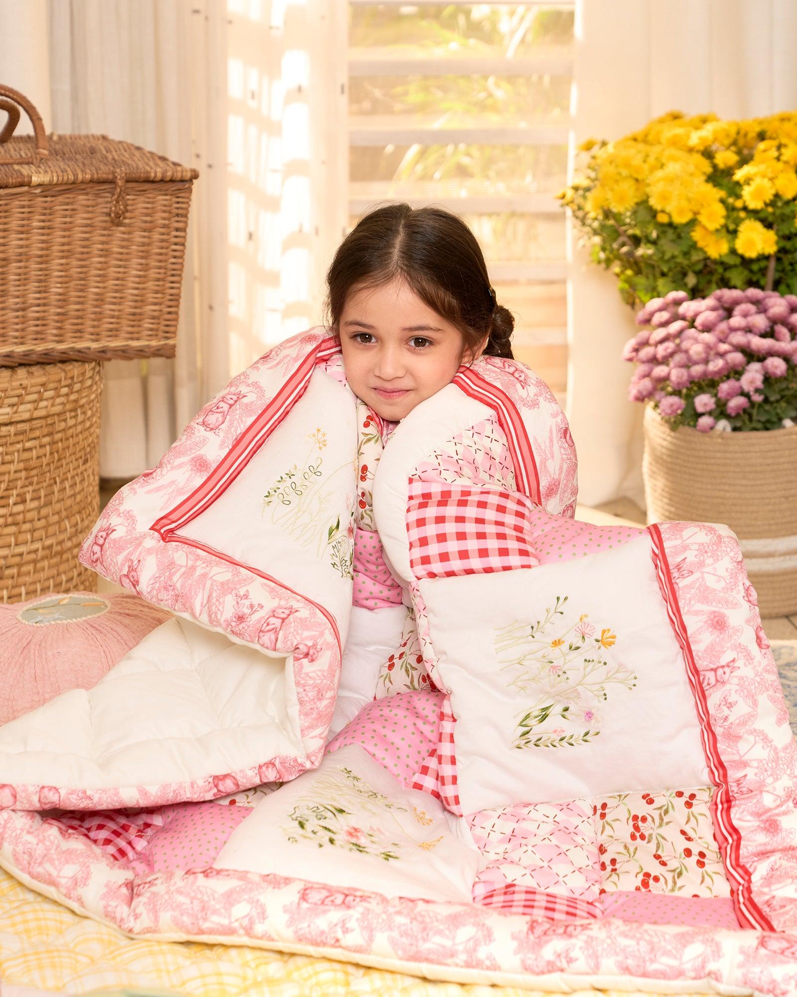 White Rabit quilt features playful rabbits & vibrant scarlet for a touch of magic. Soft cotton & cozy fiber filling for ultimate comfort. Machine wash gentle cycle at 30°C. Avoid harsh hardware, dry in shade