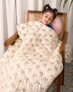 Hand-stitched White Jasper Quilt made from 100% muslin fabric, featuring an all-over delicate floral print on a soft cream base , lightweight, breathable, and perfect for cozy comfort.