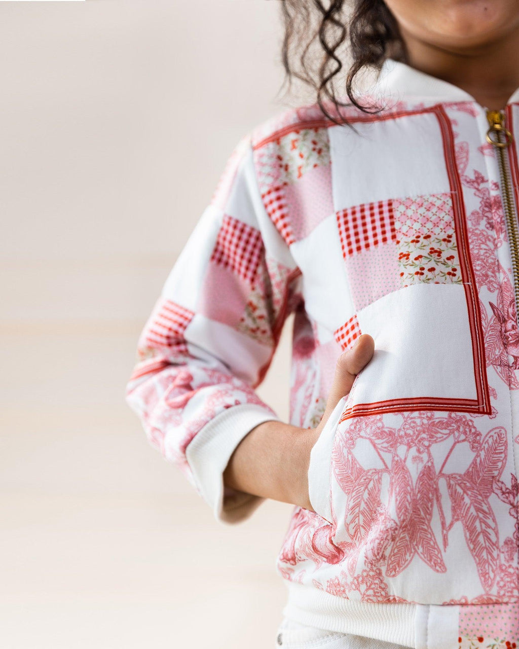 Laad`s kid in Full-length one piece sunlit ghera dress lehenga style with hand-embroidered crocheted flowers, umbrella sleeves
