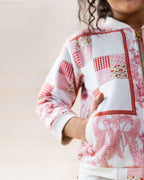 Laad`s kid in Full-length one piece sunlit ghera dress lehenga style with hand-embroidered crocheted flowers, umbrella sleeves