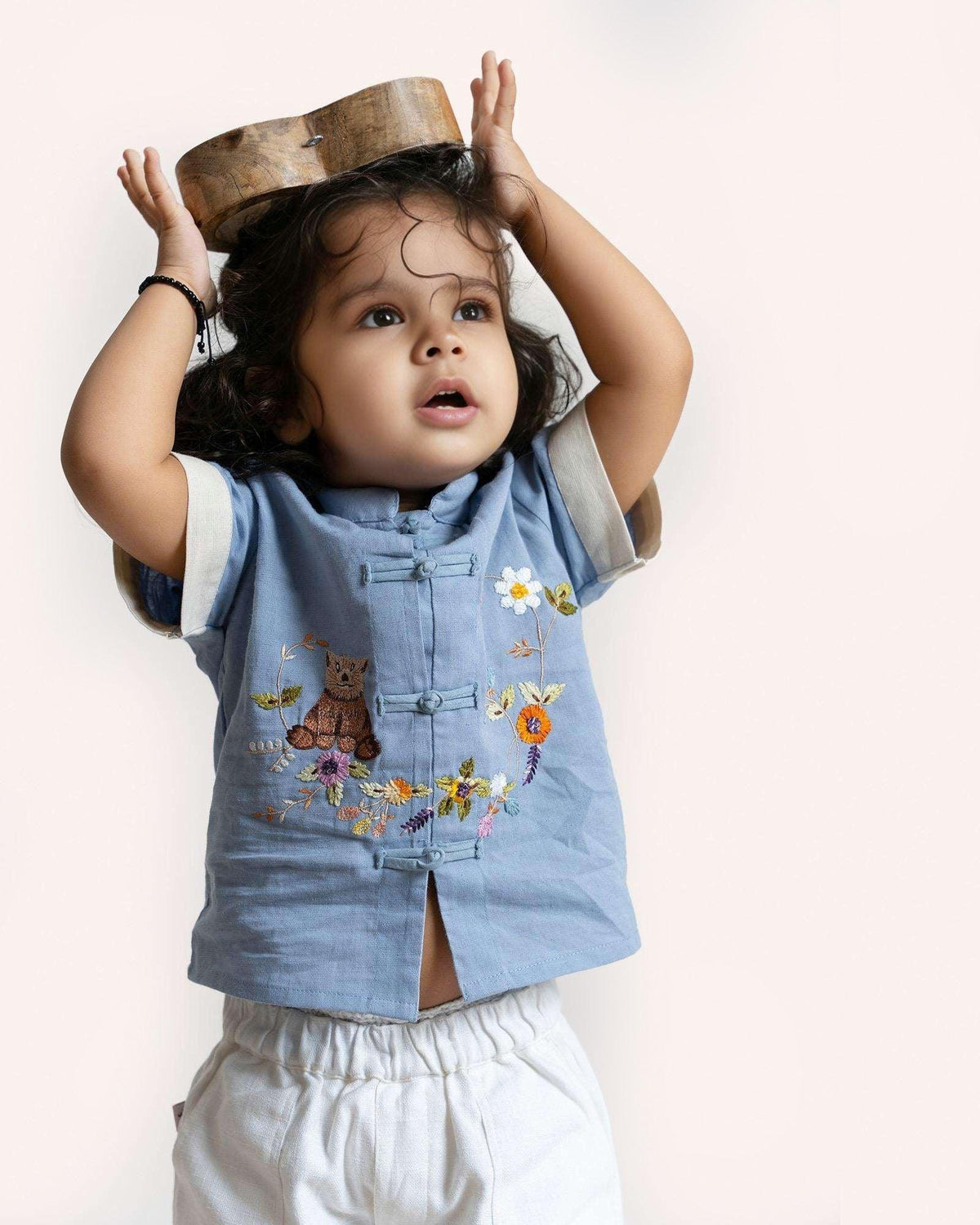 Cool summer blue ted shirt!   Your fave playful teddy in hand-crafted embroidery adds fun for kids,  loop buttons & mandarin collar keep it stylish.