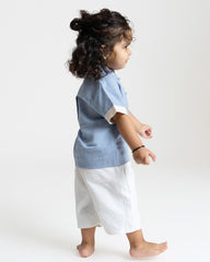 Cool summer blue ted shirt!   Your fave playful teddy in hand-crafted embroidery adds fun for kids,  loop buttons & mandarin collar keep it stylish.