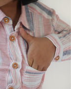 LAAD`S boy wearing candy stipe co-ord set, classic shirt with bermuda shorts.