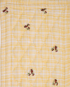 Delightful quilt features embroidered cherries & blends seamlessly with any nursery. Soft cotton & cozy filling for ultimate comfort.