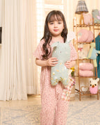 Laad`s child is wearing the adorable daisy onesie boasts a comfy round neck & wooden button front. A spacious pocket is adorned with charming hand-embroidered flowers & butterflies. Super soft fabric & a relaxed fit keep your little one happy & comfy all trip long!