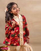 Girl wearing a handcrafted floral red kimono style party wear sharara with embroidered neckline and paired with  flared ivory sharara pants – perfect girls festive kidswear, occasion and celebration wear by LAADindia.