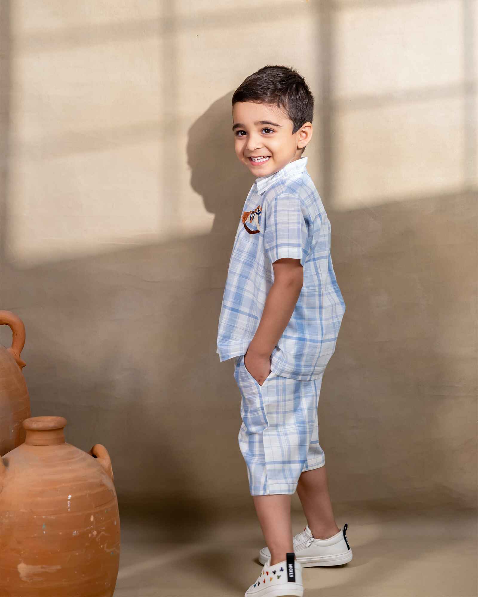 LAAD`S kids in co-ord set featuring a light blue and white shirt with hand-embroidered playful  horse . perfect occasion  birthday party wear by laadindia.
