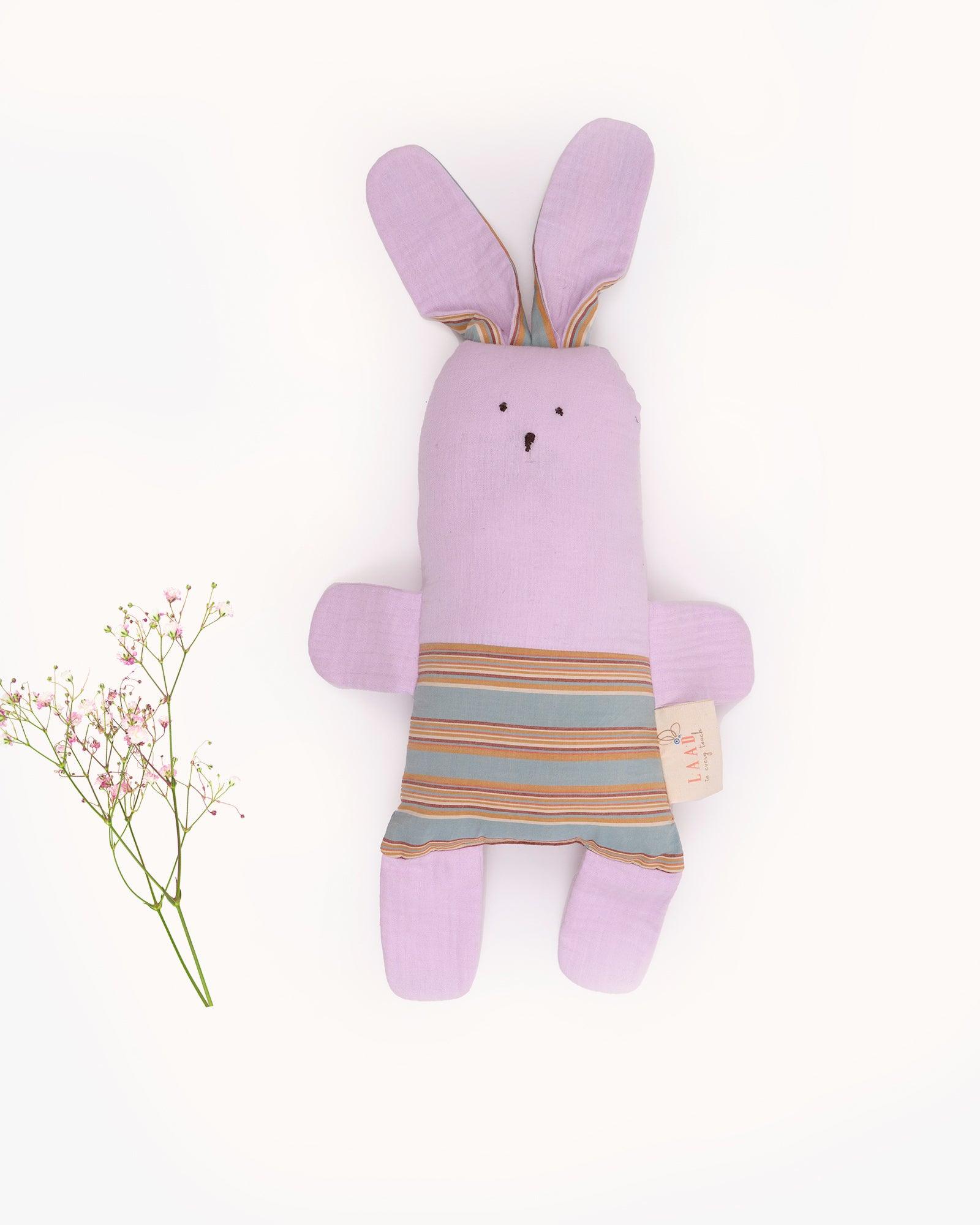 June is Made from muslin & micro-fiber filling. Adorable lavender plush in a striped costume. Soft & comfy, cylindrical for arm/leg/head support. Helps position baby for sleep or tummy time. Baby's bestie & playmate!