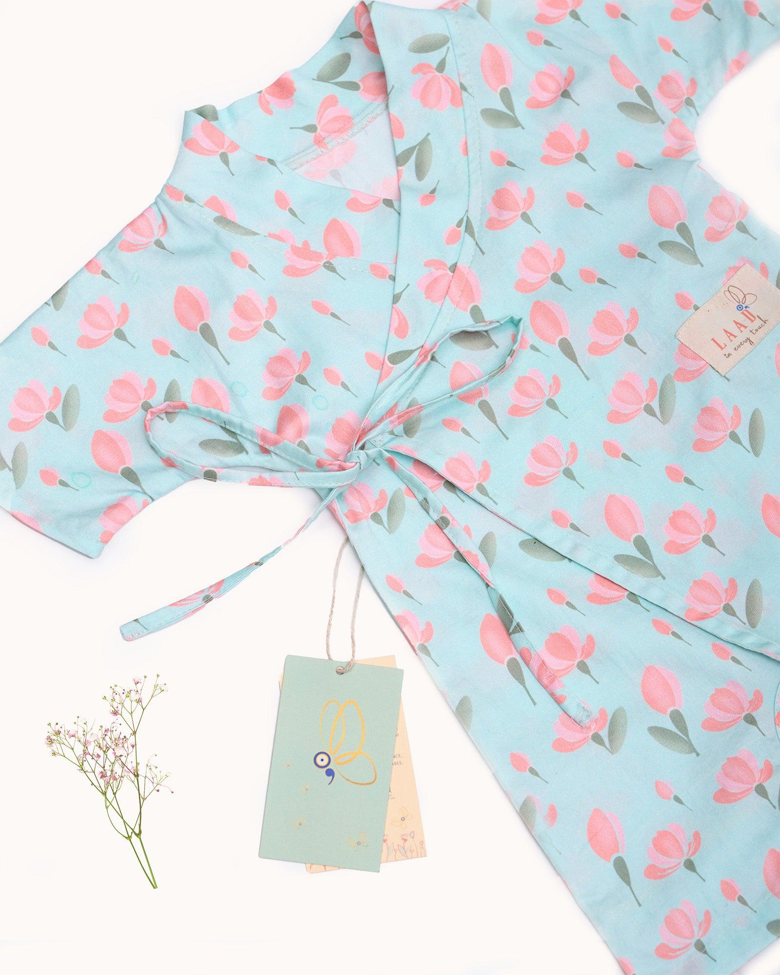 Sustainable adorable mint green tulip kimono romper is a delightful one-piece outfit, designed to capture the essence of a meadow in full bloom. This mint green kimono-style design, adjustable straps, and 100% cotton fabric. Made in India made in India with care by Laad in Every Touch.