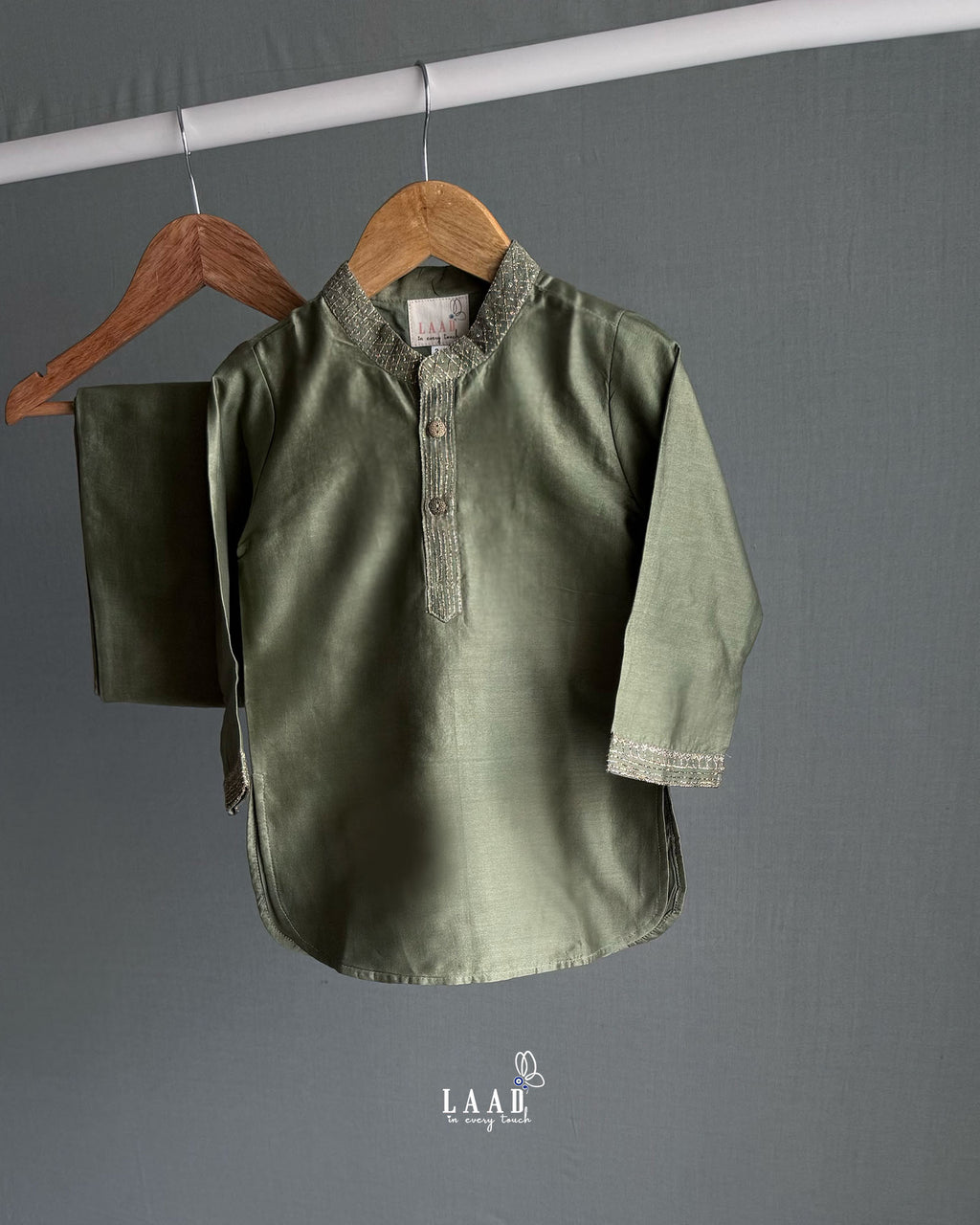 royal Moss Green Bandhgala Kurta Pyjama - Festive elegance. 2-piece set. Bandhgala collar, full sleeves. Knee-length kurta with badla work. Soft cotton lining perfect for baby skin by laadindia.com