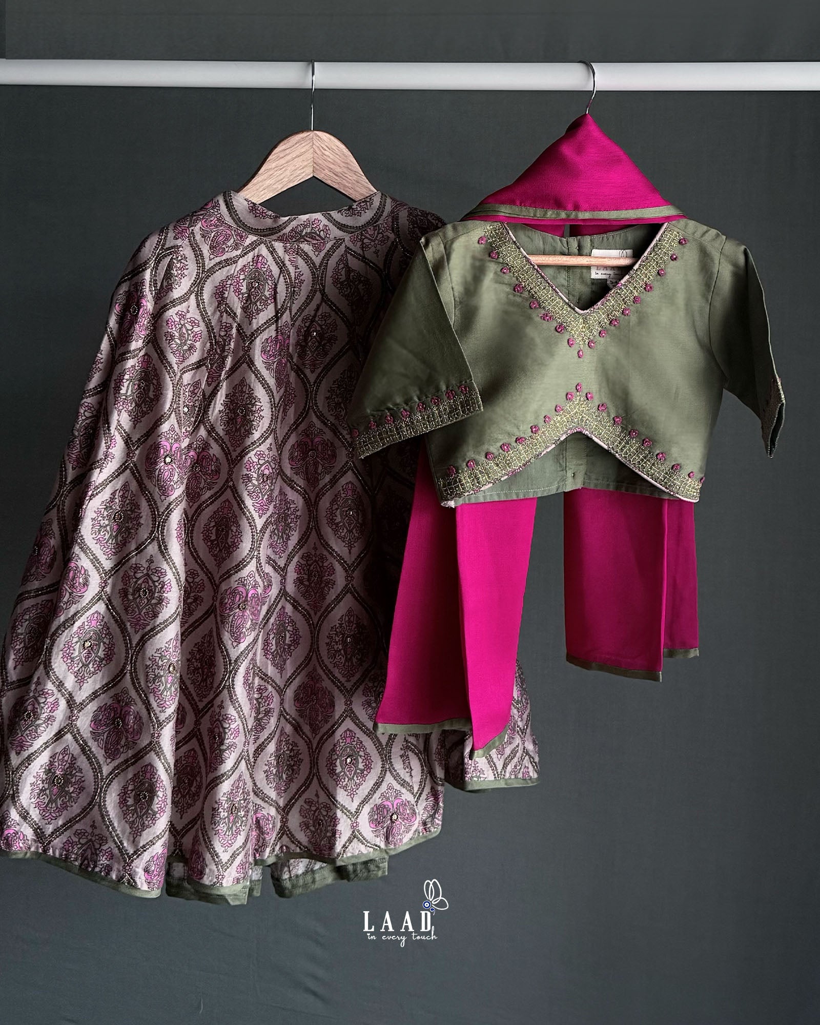 Moss green lehenga, blouse, dupatta. Silk chanderi, cotton mulmul lining. Hand-embroidered, badla work, ari-handwork. Paisley prints, beads and trims perfect wedding attire. by laadindia.com