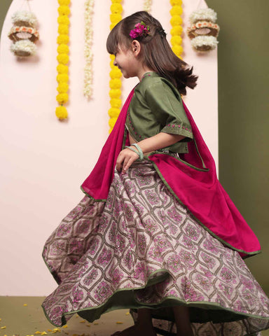 Moss green lehenga, blouse, dupatta. Silk chanderi, cotton mulmul lining. Hand-embroidered, badla work, ari-handwork. Paisley prints, beads and trims perfect wedding attire. by laadindia.com