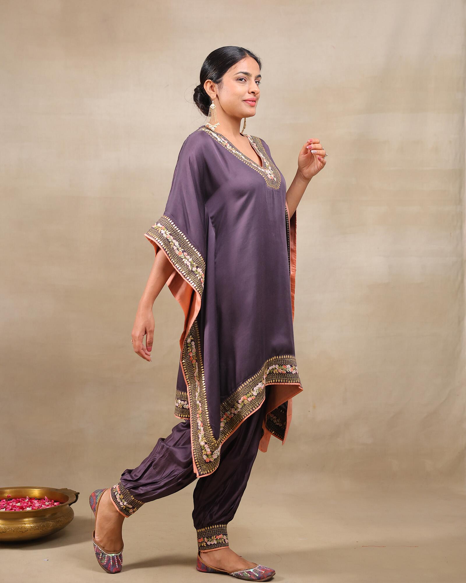 Plum purple embroidered kaftan with gold floral details, paired with dhoti pants – elegant festive wear outfit for weddings and diwali party