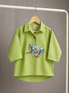 Lime green boys co-ord set with embroidered horse motif and vibrant striped pants by LAAD.