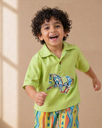 Lime green boys co-ord set with embroidered horse motif and vibrant striped pants by LAAD.