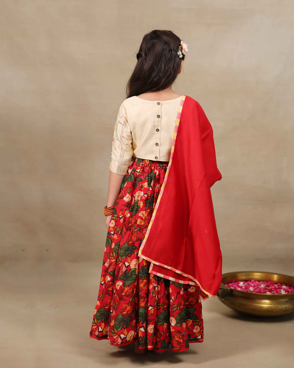 Young girl wearing LAAD’s  floral red rose lehenga set with embroidered perfect net lehenga choli with dupatta girls festive wear for kids, perfect for weddings and celebrations