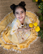 Laad`s kid in Full-length one piece sunlit ghera dress lehenga style with hand-embroidered crocheted flowers, umbrella sleeves