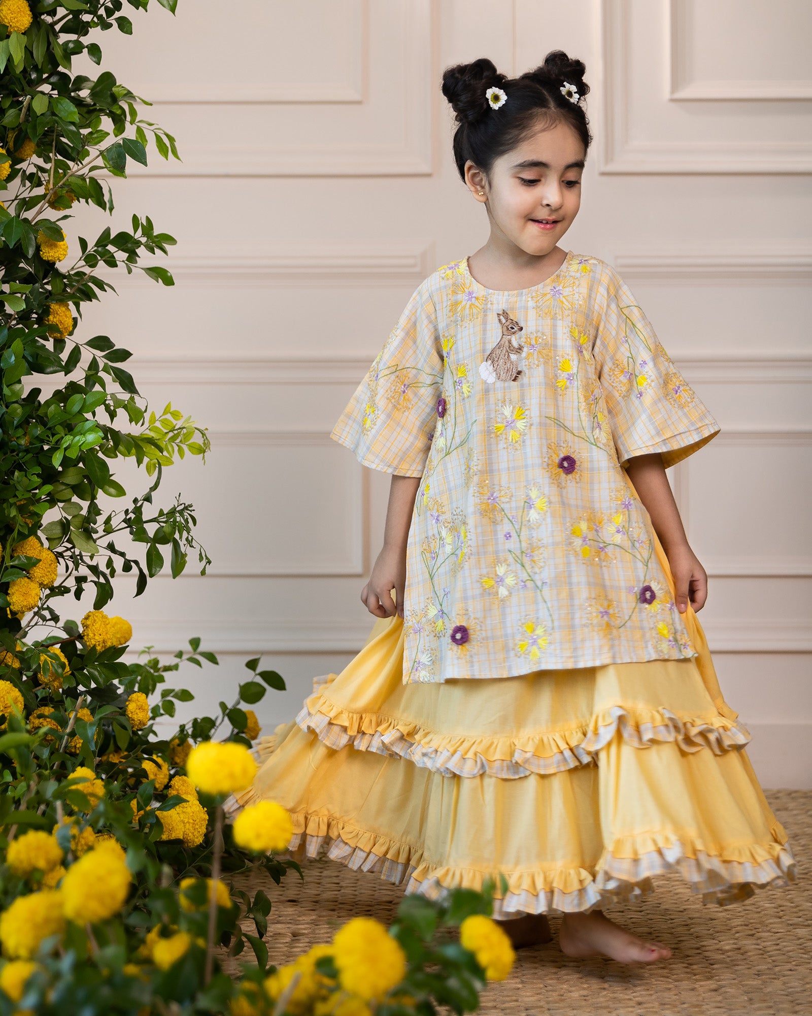 Laad`s kid in Full-length one piece sunlit ghera dress lehenga style with hand-embroidered crocheted flowers, umbrella sleeves