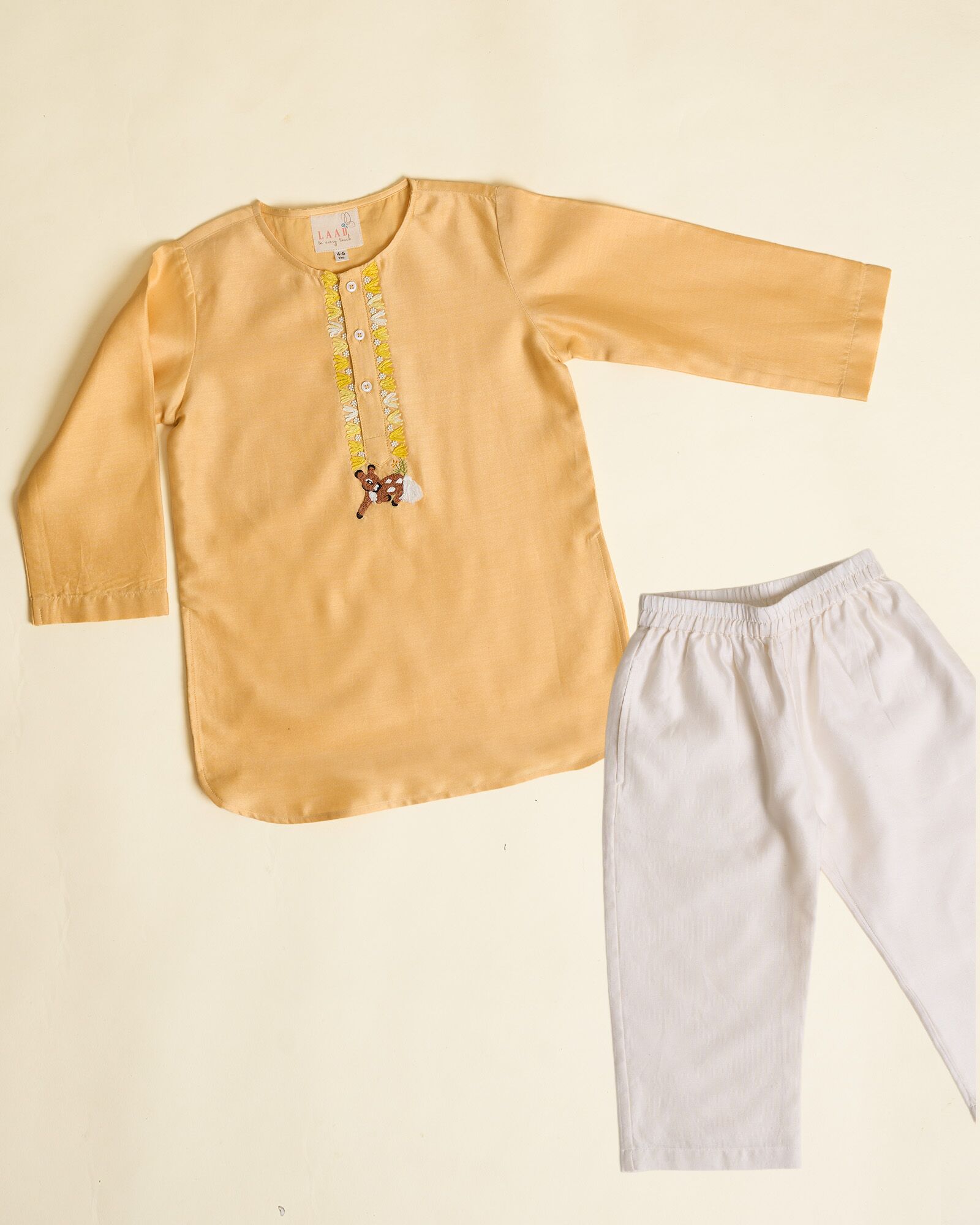 Elegant yellow kurta pyjama set for kids by Laad India, featuring delicate beadwork, intricate hand embroidery of a bambi, and a soft cotton lining for ultimate comfort. Perfect ethnic wear for festive occasions and celebrations