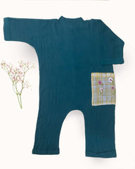  Boy wearing LAAD teal cotton bandhgala jumpsuit with wooden buttons and an embroidered bear patch fun large pocket.