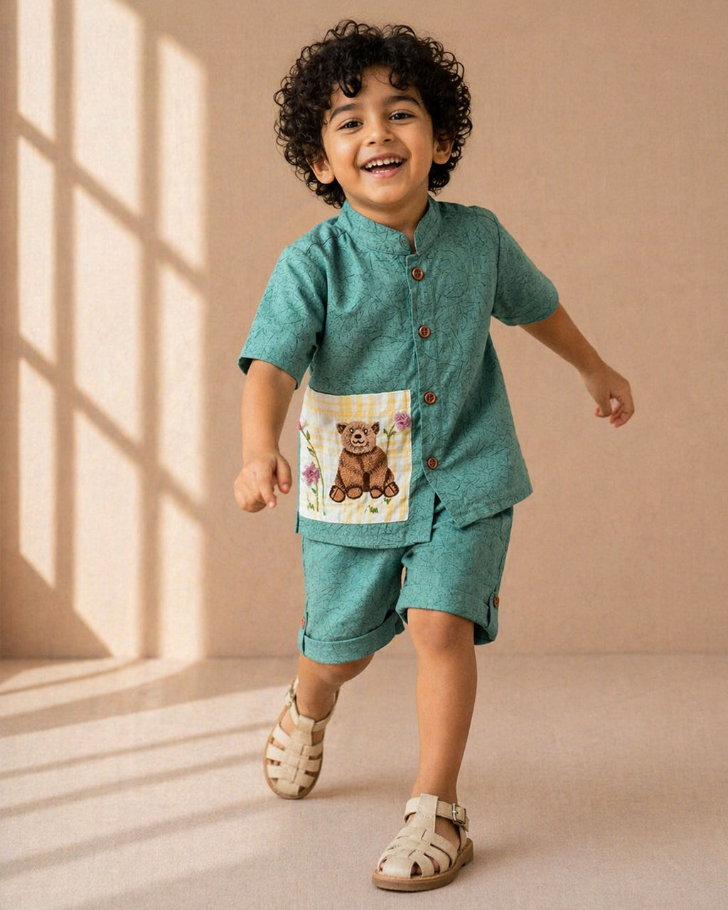 Ted Bagh Co-ord by LAAD — boys cotton co-ord  linen set featuring a mandarin collar shirt with wooden button closure, handcrafted bear appliqué pocket with floral embroidery, and matching tailored shorts.