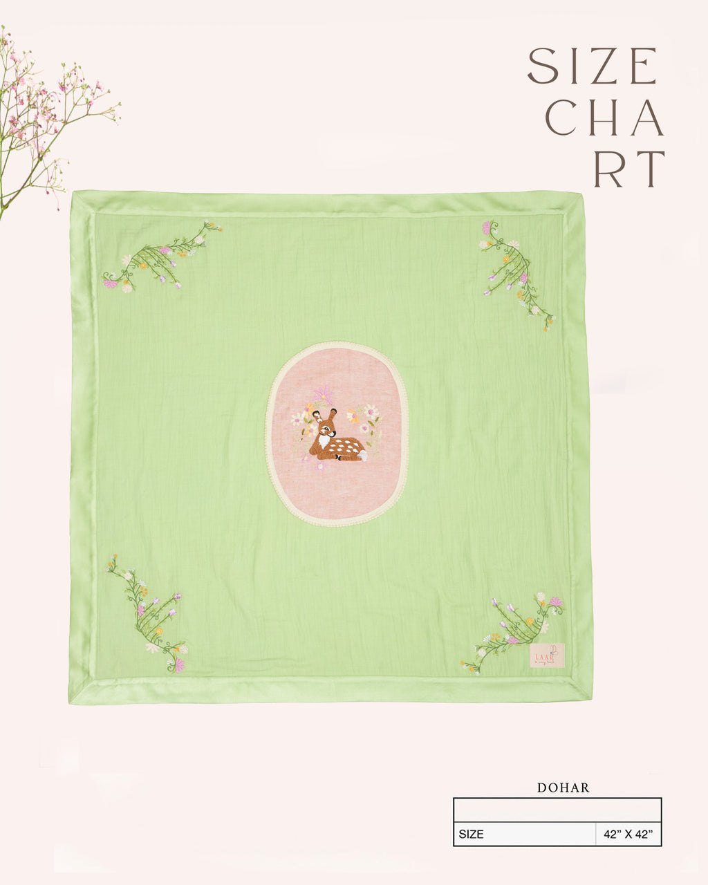soft green muslin baby dohar featuring hand-embroidered floral details and a bambi nested on a pastel pink patch. Lightweight and breathable, ideal for keeping babies snug and cozy.