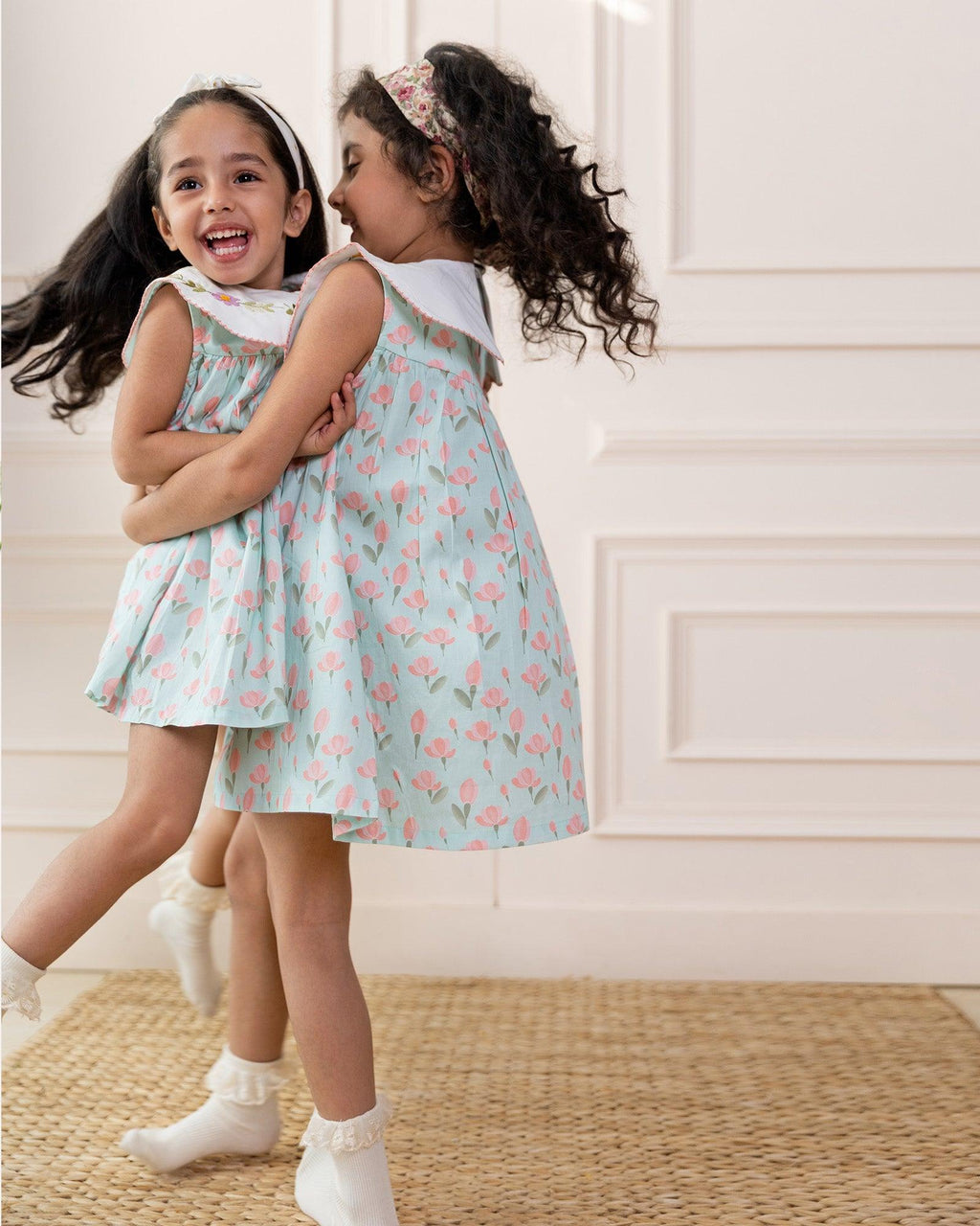 Twirl into spring with tulip dress! Mint A-line dress features tulip print & a scalloped embroidered collar. Breezy, 100% cotton. #LaadIndia 