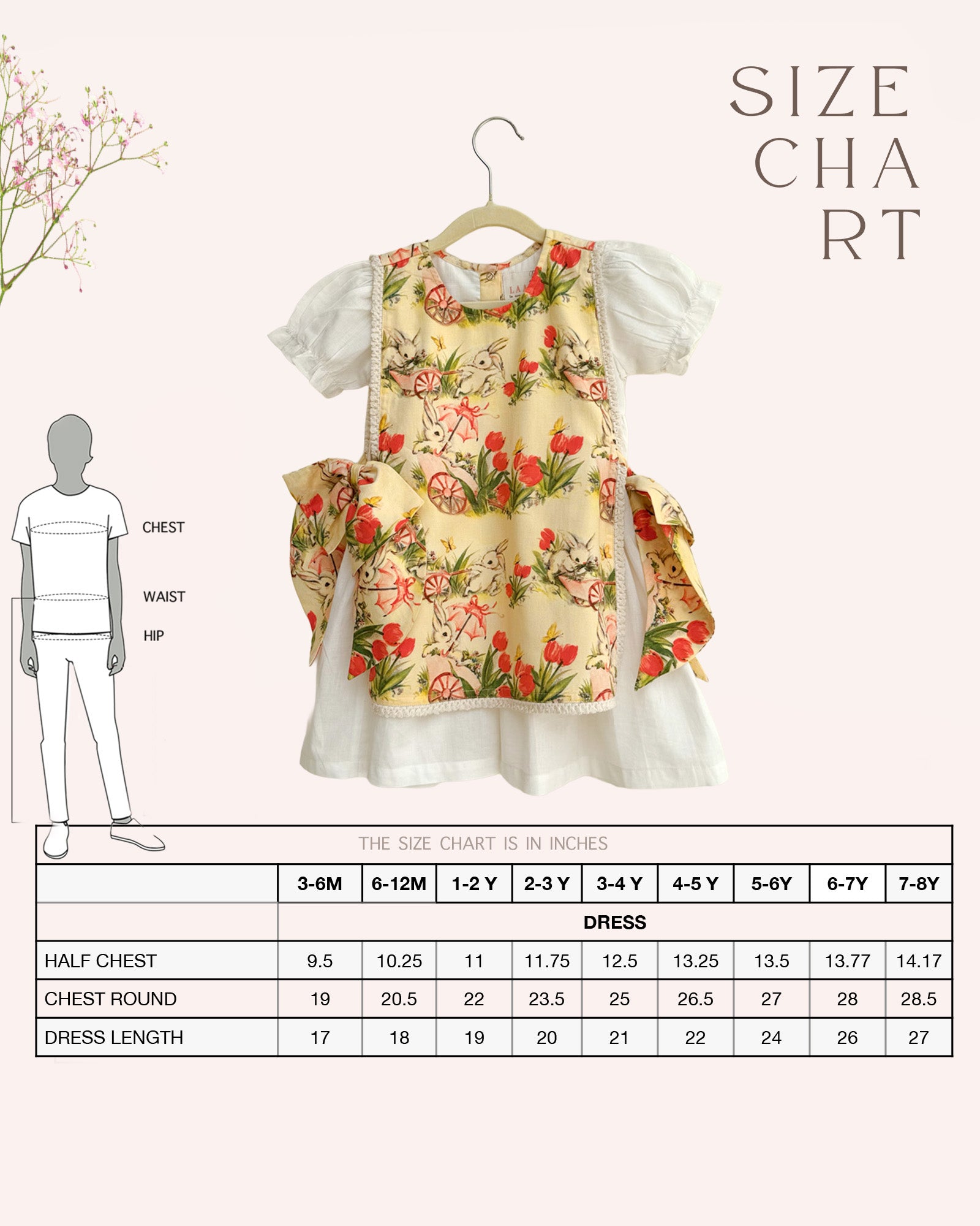 LAAD`S Girl in floral apron dress with a bunny and tulip print, layered over a white puff-sleeve dress. Features ruffled side panels and delicate lace trim. Soft, breathable fabric for comfort and charm.