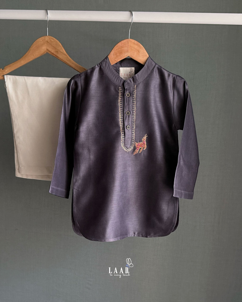 Young boy wearing LAAD India vintage grape kurta with embroidered detail, paired with cream pants a perfect boy`s ethnic wear kurta pyjama set