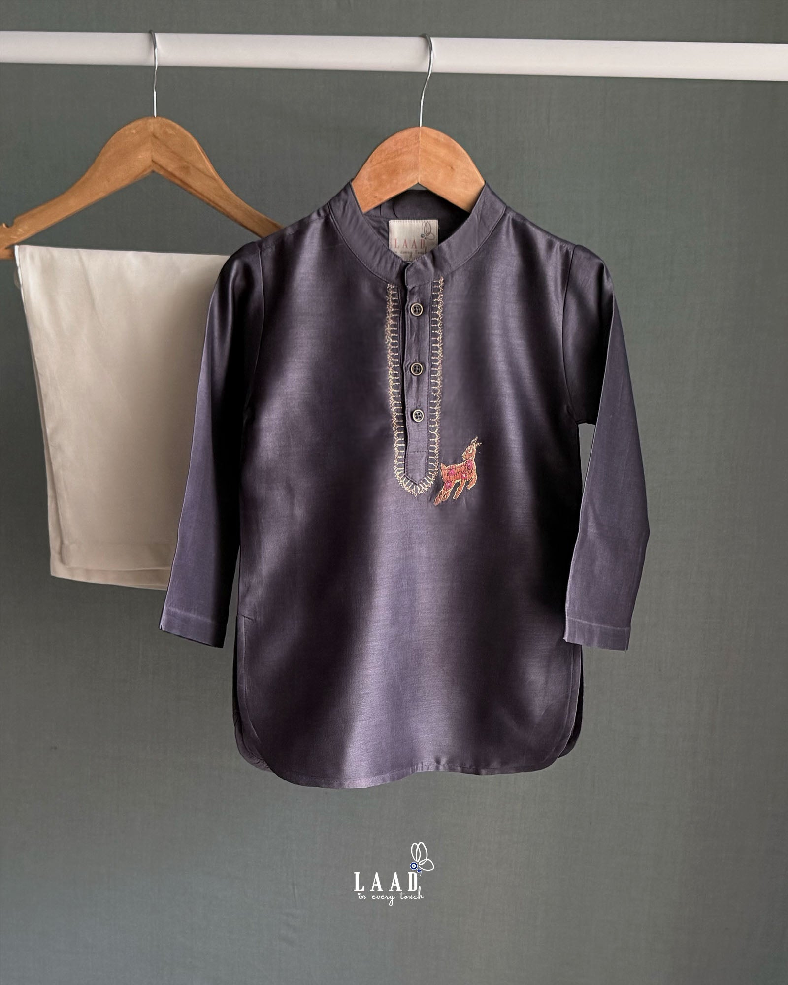 Young boy wearing LAAD India vintage grape kurta with embroidered detail, paired with cream pants a perfect boy`s ethnic wear kurta pyjama set