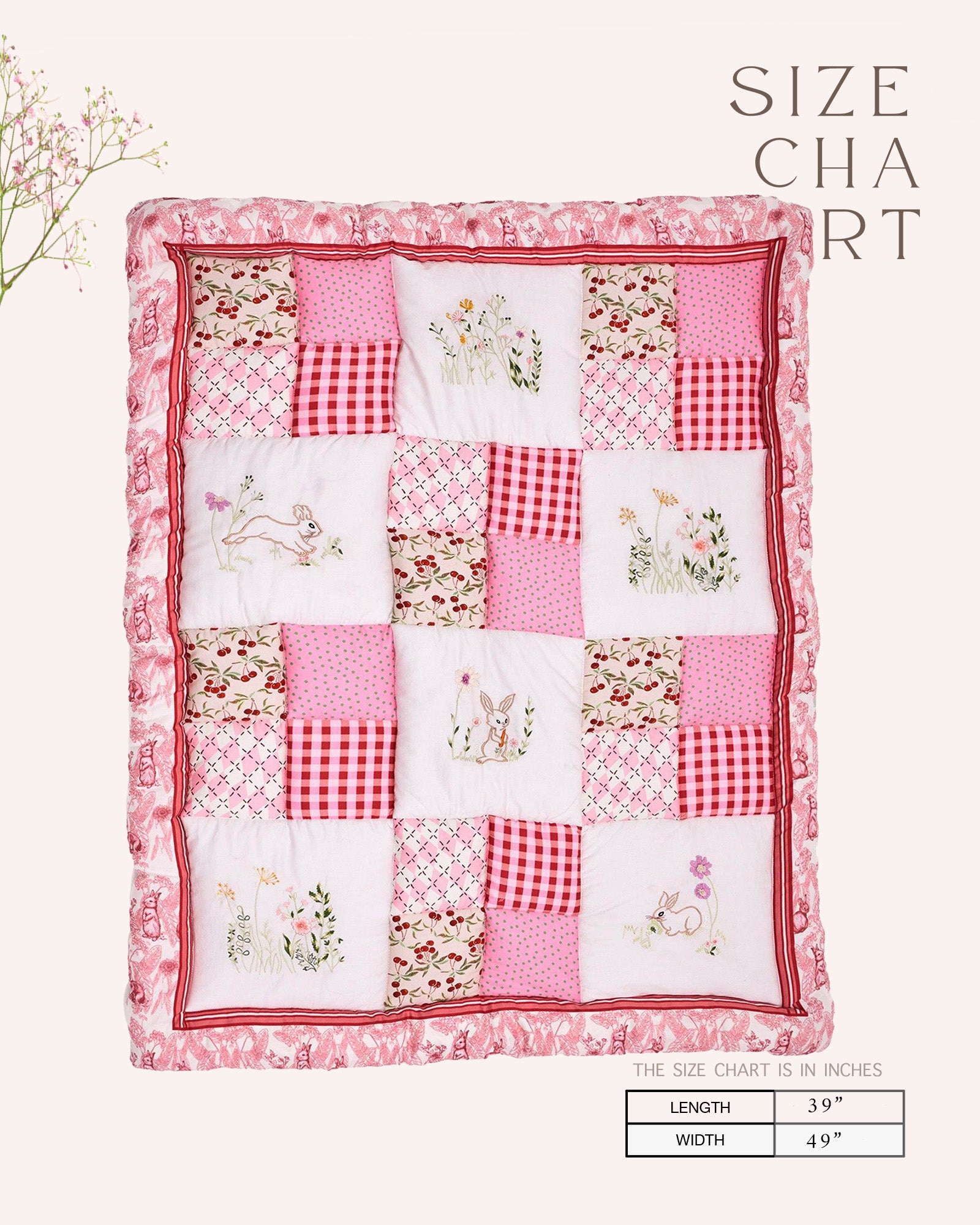 laad`s girl wearing white Rabit quilt features playful rabbits & vibrant scarlet for a touch of magic. Soft cotton & cozy fiber filling for ultimate comfort. 